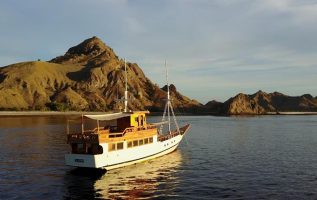 DAILY TRIPS BY LOCAL WOODEN BOAT